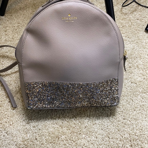 Medium size Kate Spade backpack purse.